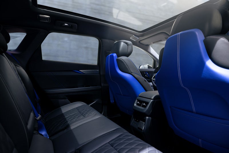 Back Seat View of the 2026 OPTIQ-V Blue Front Seats, Sun Roof, and Interior | Alexander Cadillac in Oxnard CA